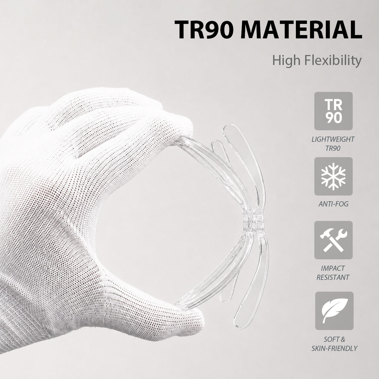 Clear prescription goggle insert flexed by hand to show its bendable frame. “TR90 MATERIAL”. “High Flexibility”.  “LIGHTWEIGHT TR90”. “ANTI-FOG”. “IMPACT RESISTANT”. “SOFT & SKIN-FRIENDLY”.